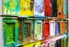 "Der Abschied" zeigt abstrakte Malerei auf einem großen Farbkasten (92 x 112 x 4 cm, Seitenperspektive). In den Mischfächer (unten) sind Gelb, Blau, Grün, Rot, Schwarz und Ocker zu sehen. Oben befinden sich 16 quadratische Teller mit den üblichen Farben einer Palette. In den Zwischenräumen sind Kleckse und Flecken sichtbar. Moderne Kunst vom Künstler Mark Hellbusch. ARTLET - Atelier Hellbusch