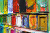 "Der Abschied" zeigt abstrakte Malerei auf einem großen Farbkasten (92 x 112 x 4 cm, Seitenperspektive). In den Mischfächer (unten) sind Gelb, Blau, Grün, Rot, Schwarz und Ocker zu sehen. Oben befinden sich 16 quadratische Teller mit den üblichen Farben einer Palette. In den Zwischenräumen sind Kleckse und Flecken sichtbar. Moderne Kunst vom Künstler Mark Hellbusch. ARTLET - Atelier Hellbusch