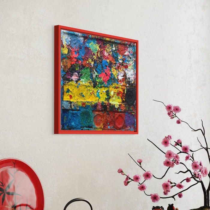 "Arena" zeigt moderne Malerei auf dem Farbkasten (eingerahmt 54 x 64 cm, in Situation) und ergibt ein Wandobjekt. In den Mischfächern (rechts) sind bunte Farbtöne und -kleckse zu erkennen. In der linken Hälfte befinden sich 5 Farbteller mit Rot, Orange, Grün, Blau und Schwarz. In den Zwischenräumen sind Farbflecken sichtbar. Es wurde experimentell gemalt. Das Gemälde ist mit Schattenfuge gerahmt. Das Original befindet sich in Wiesbaden bei Frankfurt. Abstrakte Kunst. ARTLET | Atelier Hellbusch.