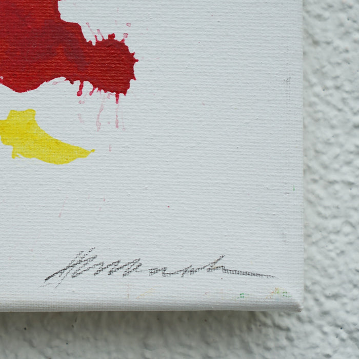 Abstraktes Gemälde mit bunten Farbresten, aus denen sich das Porträt eines Clowns andeutet, Acryl auf Leinwand, 30 x 24 cm (Signatur). Atelier Hellbusch.