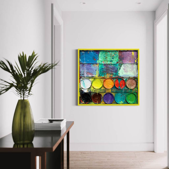 "Der Sonderling", Malerei auf einem überdimensionierten Farbkasten (110x120 cm, in Situation). In den Mischfächer (oben im Bild) sind Grün, Blau und Violett zu sehen. Unten befinden sich 10 Farbteller mit den üblichen Farben einer Palette. In den Zwischenräumen sind Farbkleckse und -flecken sichtbar. Moderne Kunst. ARTLET - Atelier Hellbusch