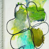 Glücksklee I (Seite) – grünes Kleeblatt in expressiver Ölmalerei aus der Serie Schmiertafel von Mark Hellbusch